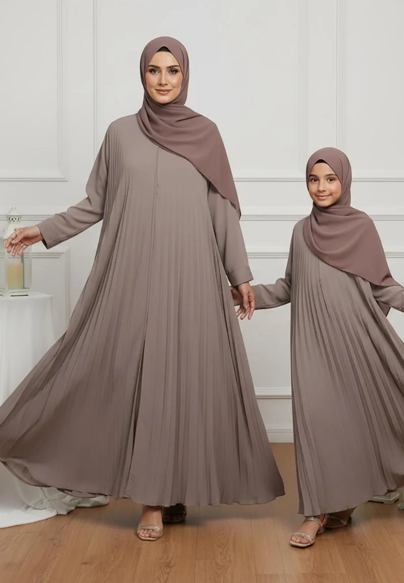Nukhbaa The Soraya Mother & Daughter Abaya: Pleated Perfection-N230AMD  (Dresses are sold individually. To create a matching mom and daughter set, please purchase two items in different sizes)
